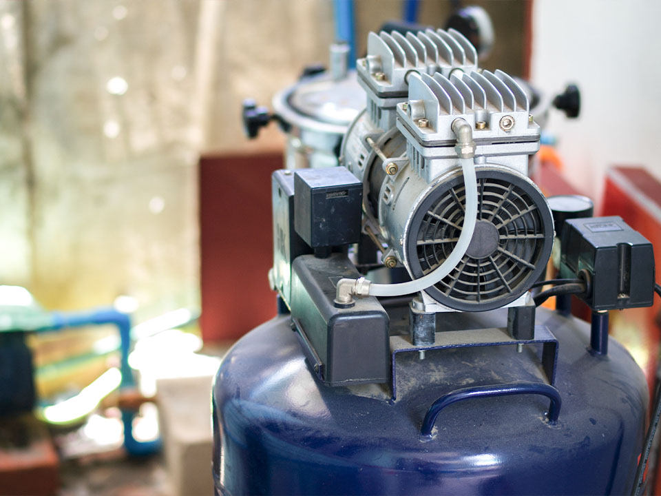 What are the functions of an air compressor?